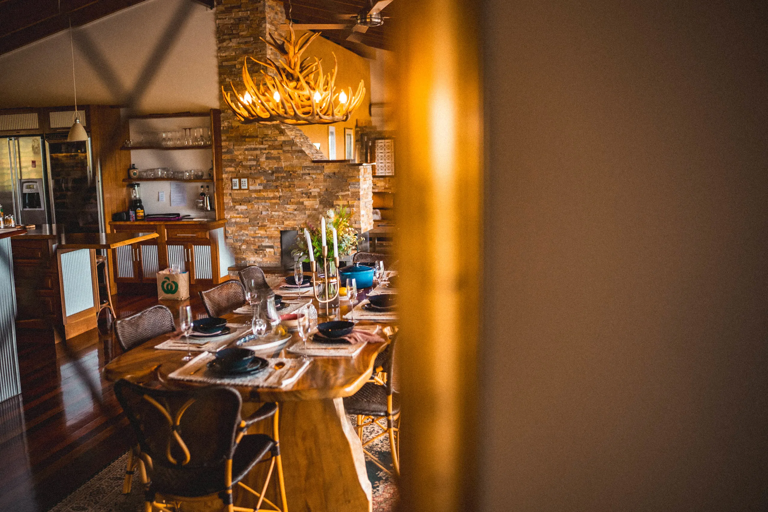 The single-slab timber dining table, set for eight