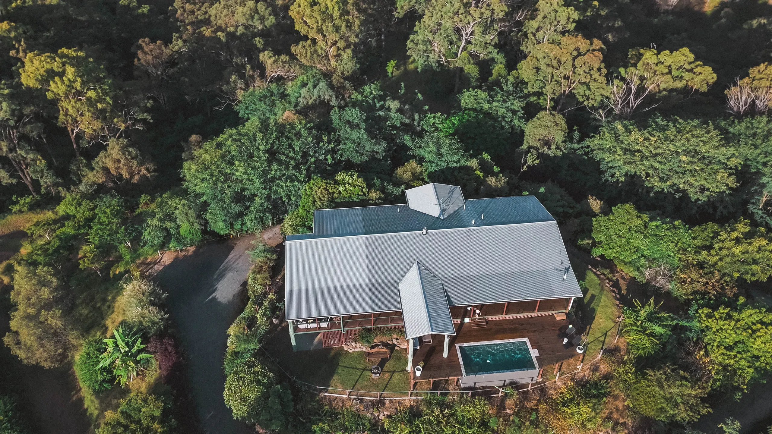 Timber-and-glass hillside home on the Eagles Nest ridgeline above the Sarabah Valley